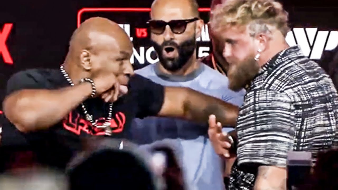 Mike Tyson SWINGS ON Jake Paul & NEARLY F*CKS HIM UP early at HEATED FACE OFF